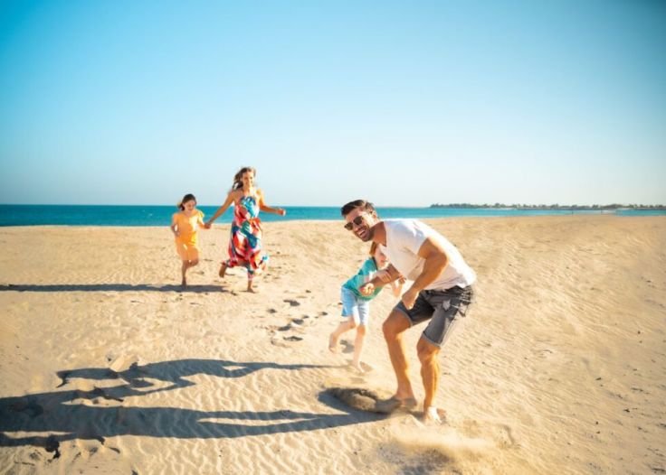 Beach family 1 min scaled 1 1024x683